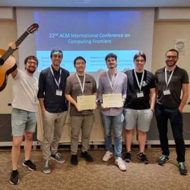 Celebrating the Best Paper Award.